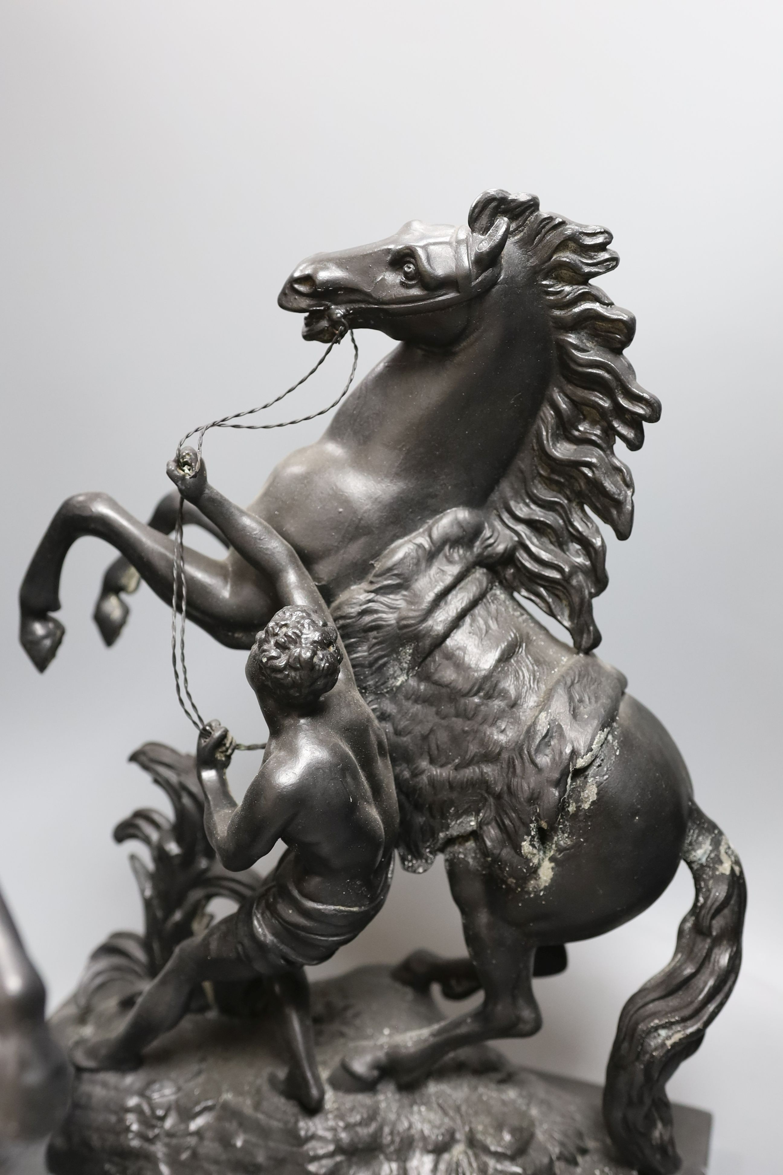 A pair of spelter Marly horse groups - 43cm tall